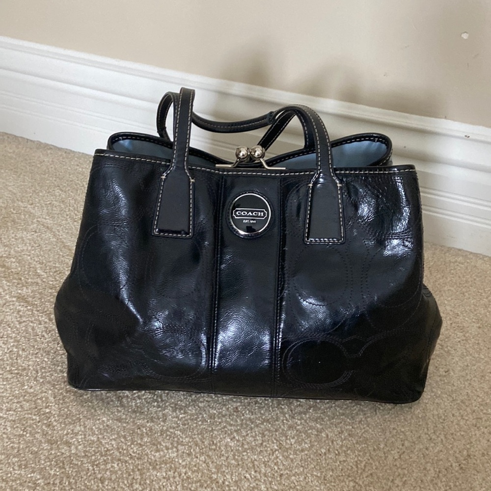 Coach black leather handbag.